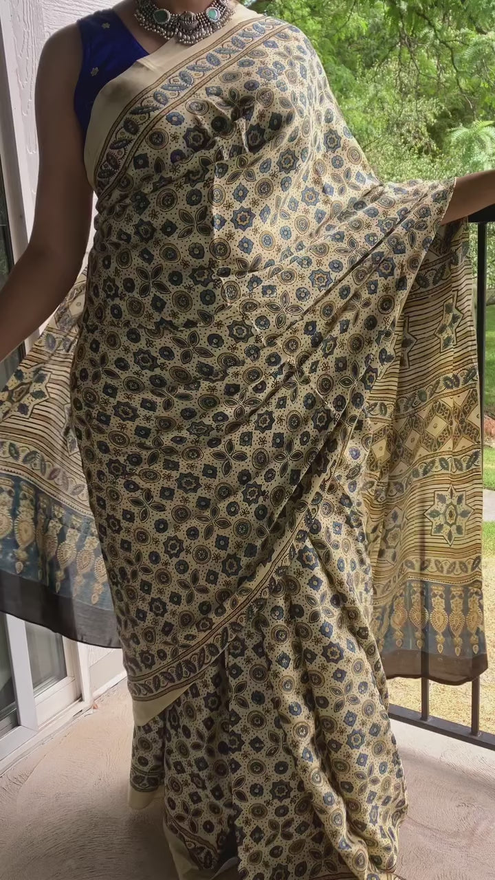 Modal Ajrakh saree without ladti patta  Ivory.